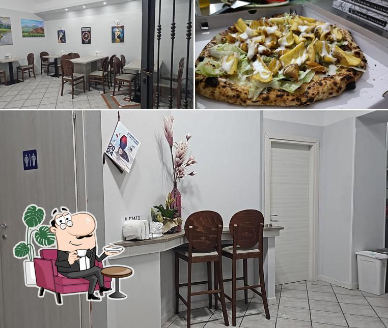 Pizzeria Arman si caratterizza per la interni e cibo