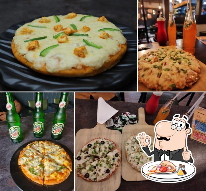 Get pizza at SB's Food Lounge