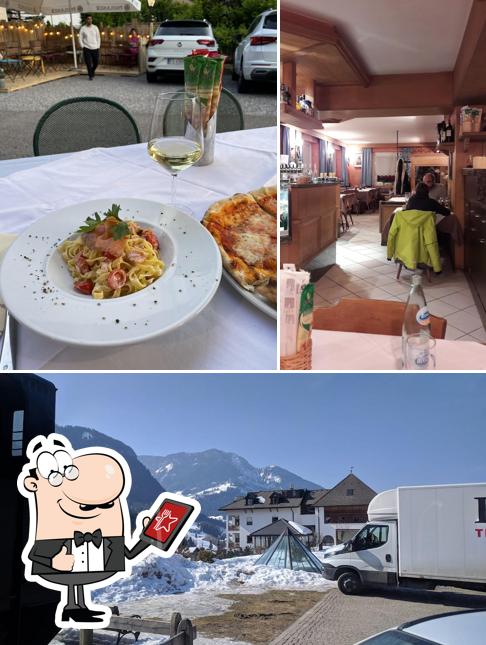 SASKIA Ristorante Pizzeria Residence si caratterizza per la esterno e bancone da bar