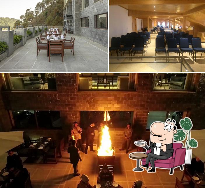 Take a seat at one of the tables at The Zion Hotel Shimla