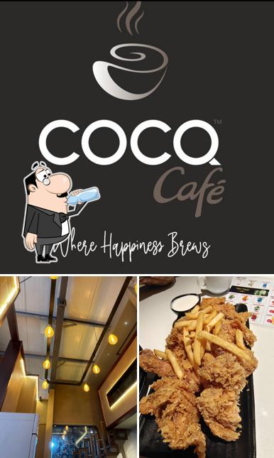 This is the image depicting drink and interior at COCQ CAFE