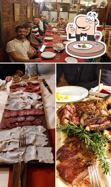 La foto della cibo e tavolo da pranzo di Osteria del Norcino