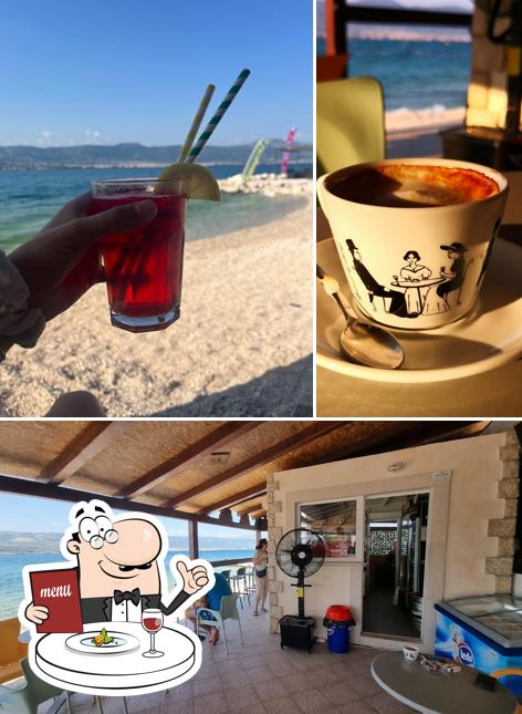 Guarda la foto che presenta la cibo e interni di Beach bar Mul