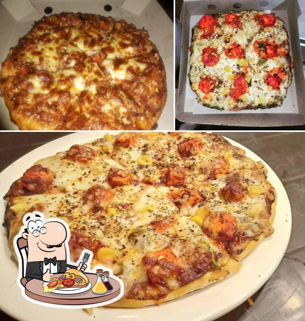 Get pizza at The Shawarma Garden