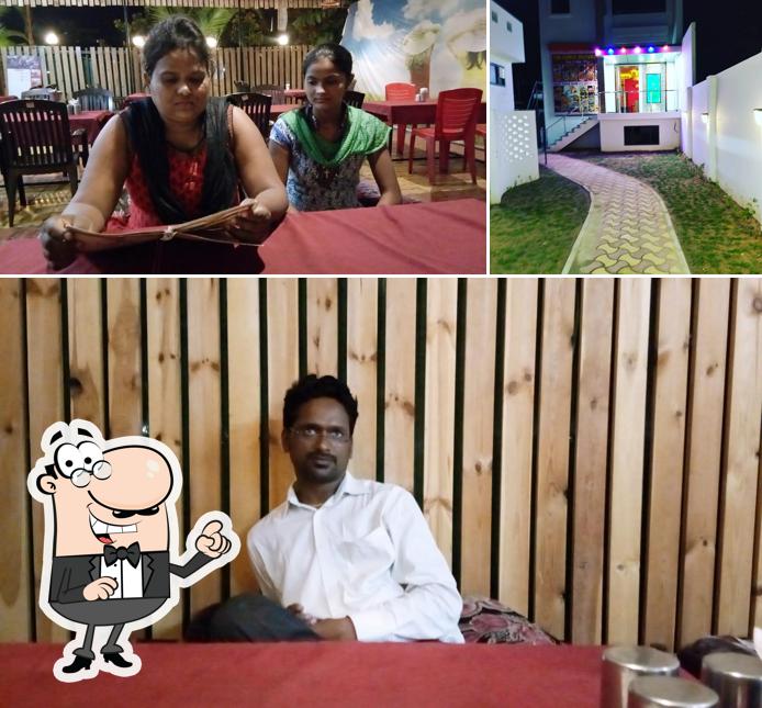 Take a seat at one of the tables at Hotel Vps