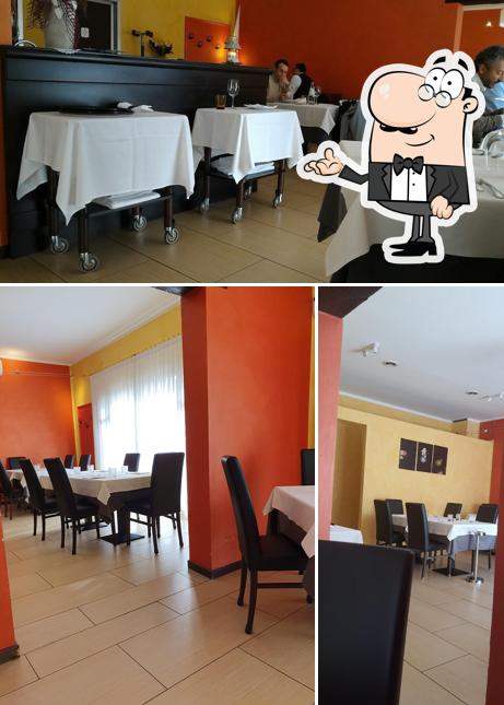 Siediti a un tavolo di Trattoria Kaprazucca