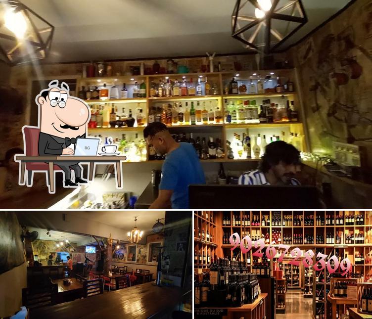 Take a seat at one of the tables at Bar High Five