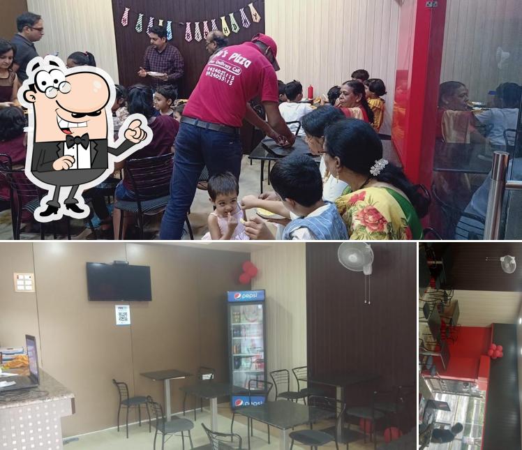 Take a seat at one of the tables at Rio's Pizza