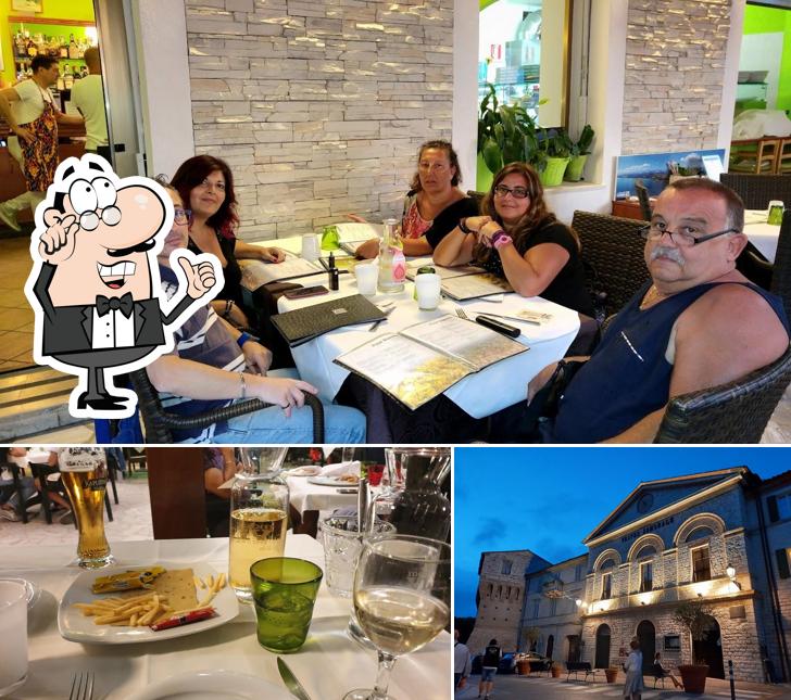 La immagine della interni e cibo di Tory Ristorante Pizzeria