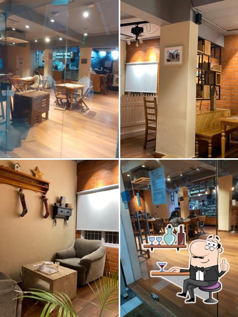 Take a seat at one of the tables at Bean Board - Chinna Waltair