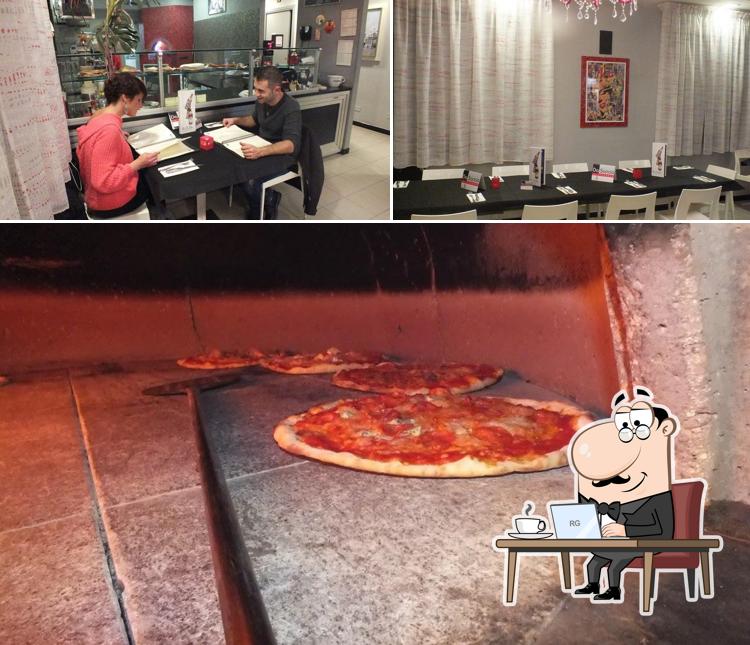 Questa è la immagine che raffigura la interni e cibo di Pizzeria Da Sancio