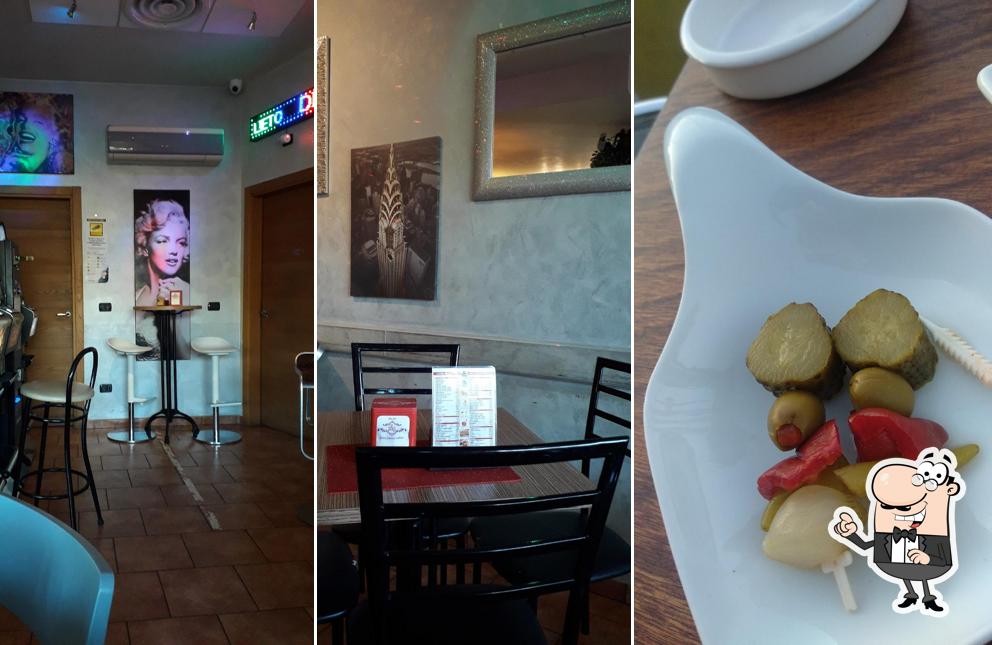 Dai un'occhiata agli interni di Happy Bar