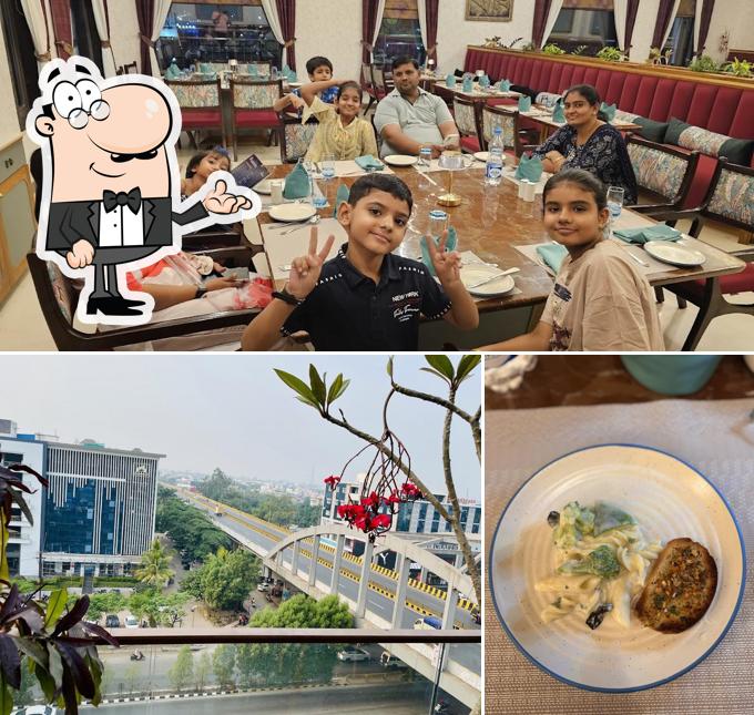 Take a seat at one of the tables at Hotel Meeravill