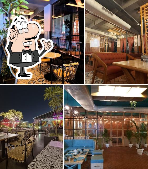 Take a seat at one of the tables at The Terai Restaurant, Banquet Hall & Rooftop Bar