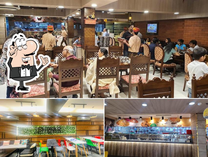 Take a seat at one of the tables at Bikanervala Rajasthani Thali Kirti Nagar