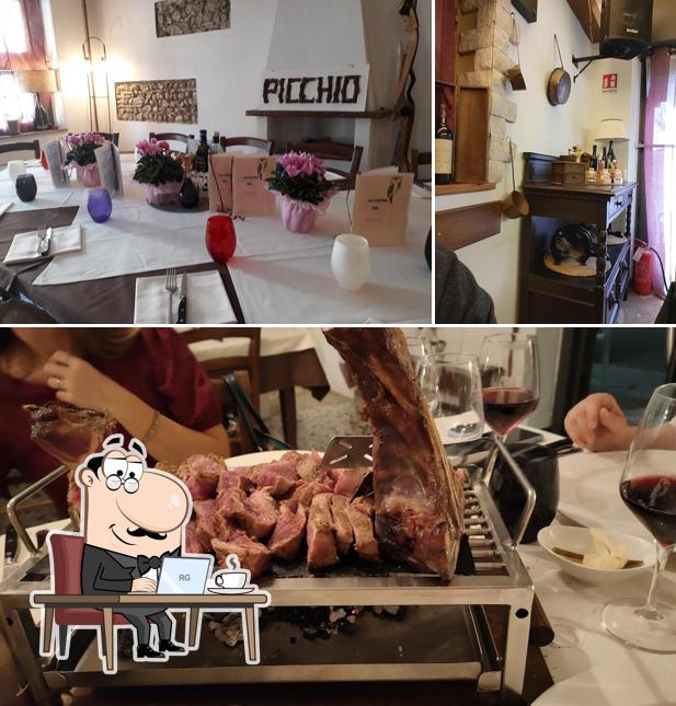 La immagine di interni e bevanda da Osteria Dal Picchio