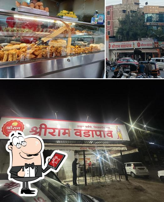 The photo of exterior and beverage at Shriram Vadapav