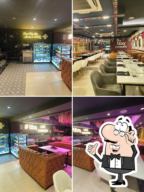 Take a seat at one of the tables at The barbeque company (KANPUR)