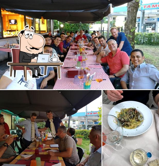 Dai un'occhiata agli interni di Pizzeria Ristorante Charlie