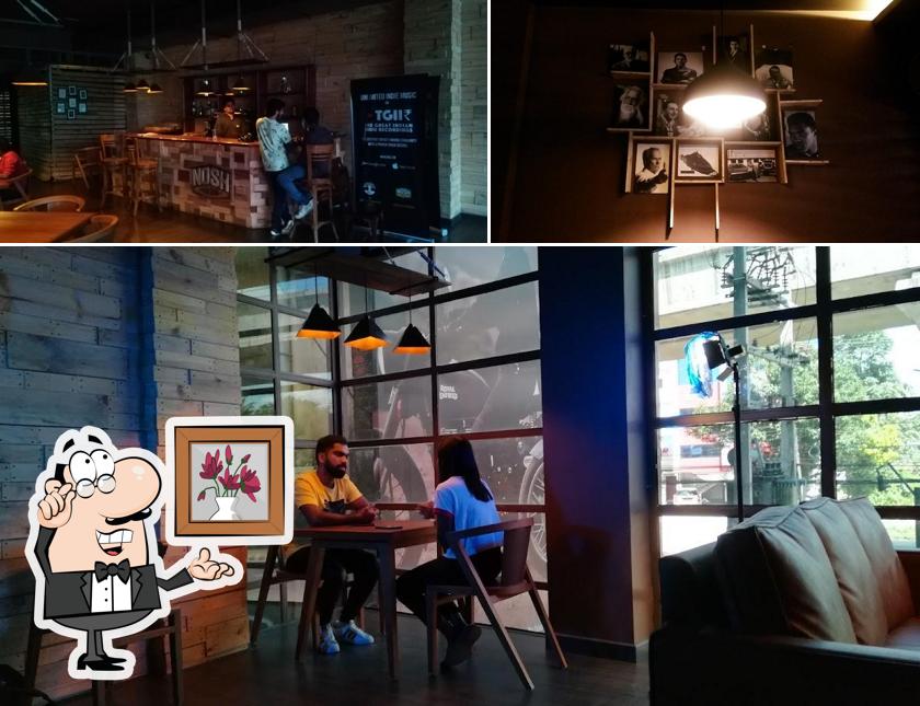 Take a seat at one of the tables at Nosh Haus Metro Pillar 106