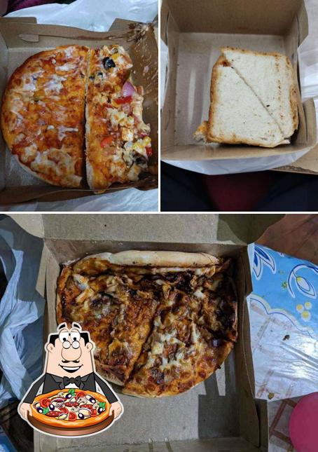 Order pizza at Oven Baked Cheesy Pizza