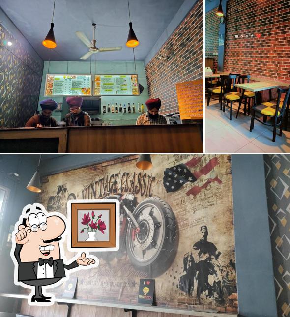 Take a look at the photo showing interior and food at Singh Pizza