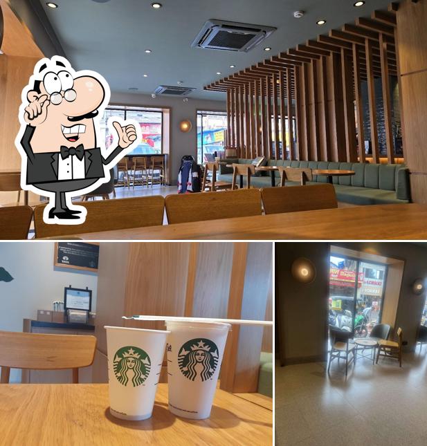 Take a seat at one of the tables at Starbucks