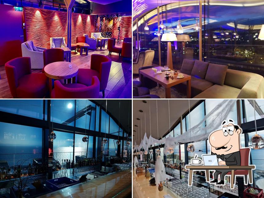 Dai un'occhiata agli interni di Waves Sky Lounge Bar