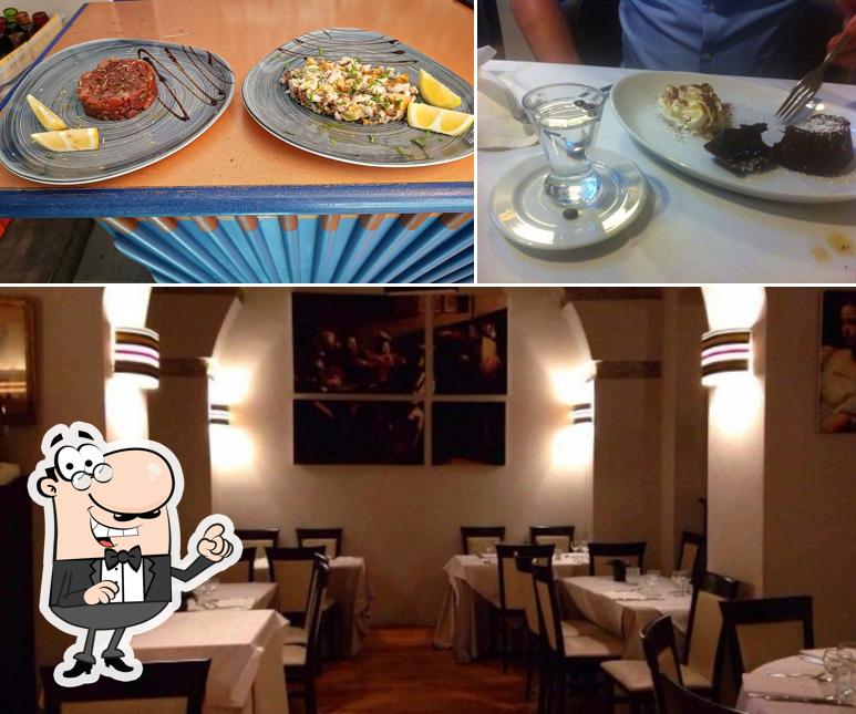 La foto di interni e tavolo da pranzo da Osteria Corsetti 1921 Roma