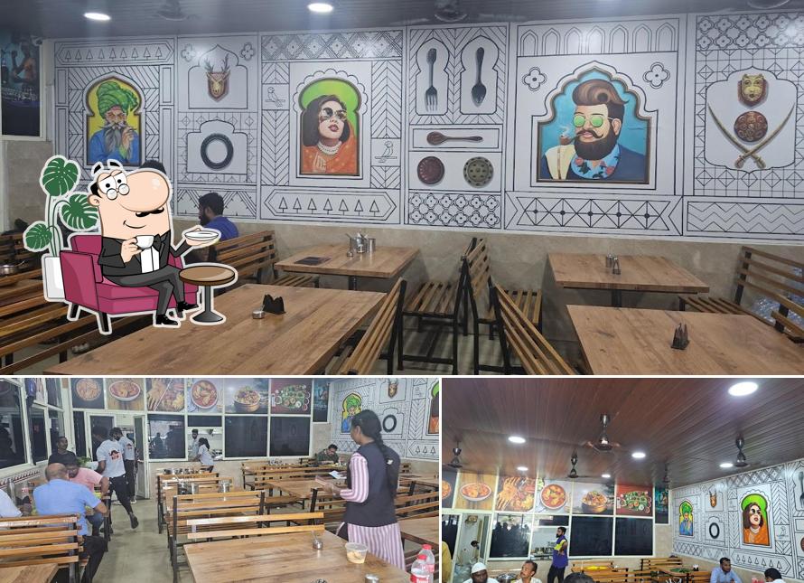 Take a seat at one of the tables at Appalaraju military hotel