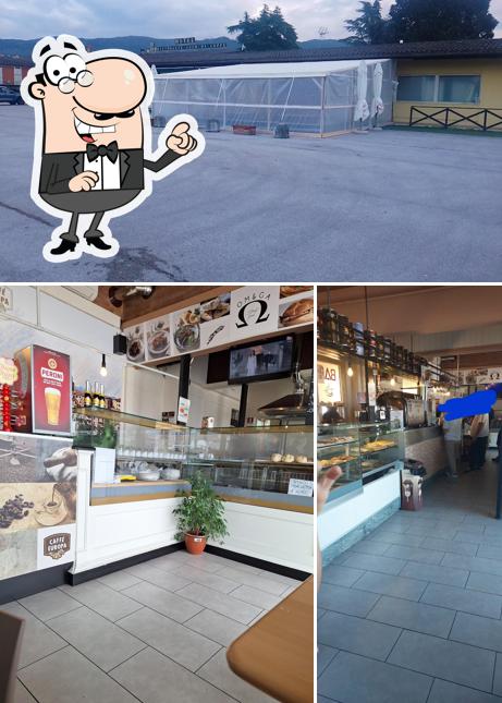 La immagine di interni e esterno da OM&GA Street Food