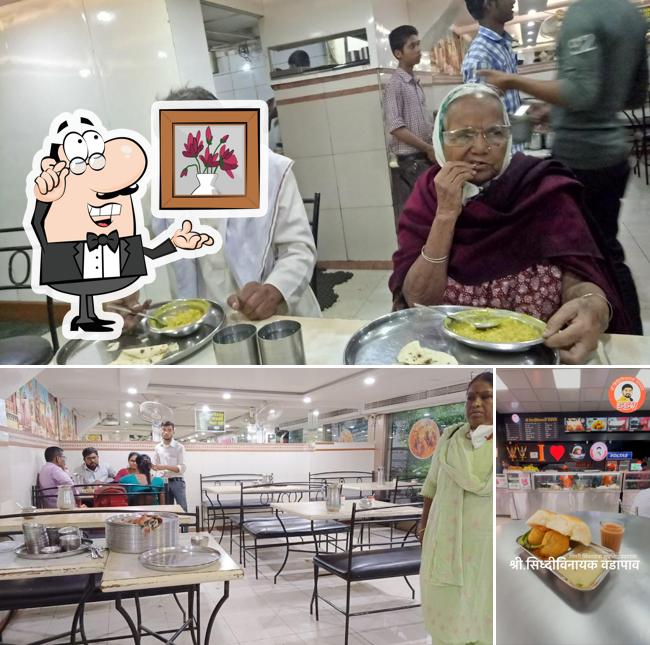 The interior of Shree Siddhivinayak Thali Restaurant