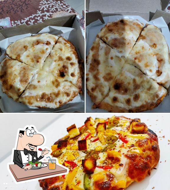 Food at Tasty Pizza nd Burger Shop