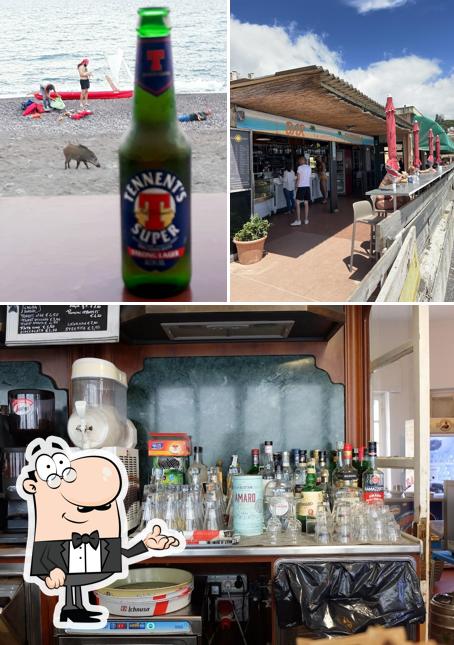 La foto di interni e birra da Ristorante Bagni Di Sole