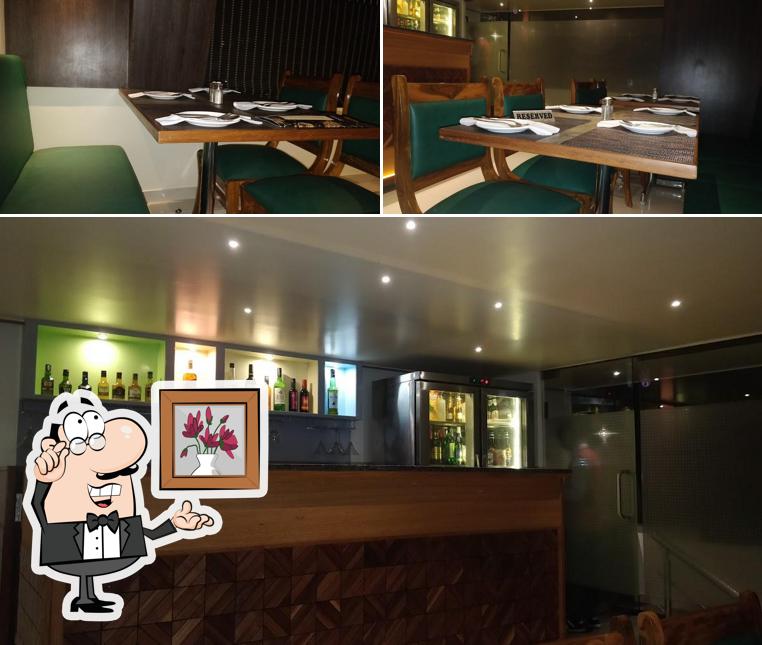 Take a seat at one of the tables at Shreshta Family Restaurant & Bar