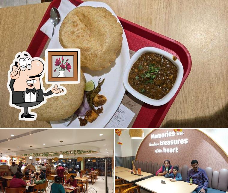 Check out the photo showing interior and food at Haldiram's