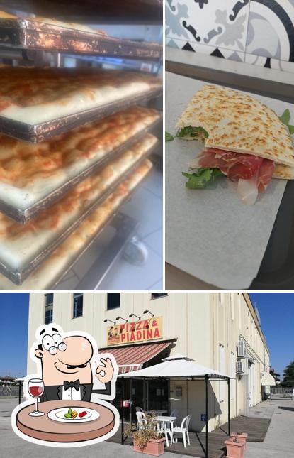 Tra le varie cose da Pizza&Piadina si possono trovare la cibo e interni