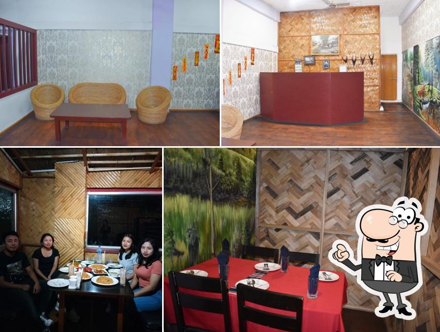 Take a seat at one of the tables at L T Mizo Belly Restaurant