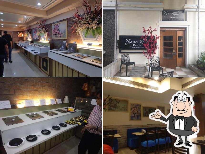 Take a seat at one of the tables at Naushijaan Restaurant - Large Range Of Awadhi Kebab
