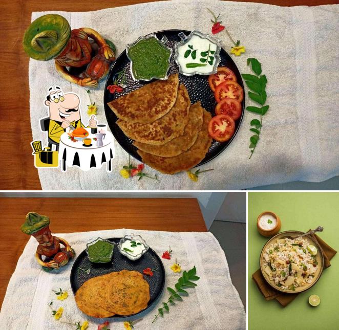 Check out the picture showing food and interior at The Desi Platform