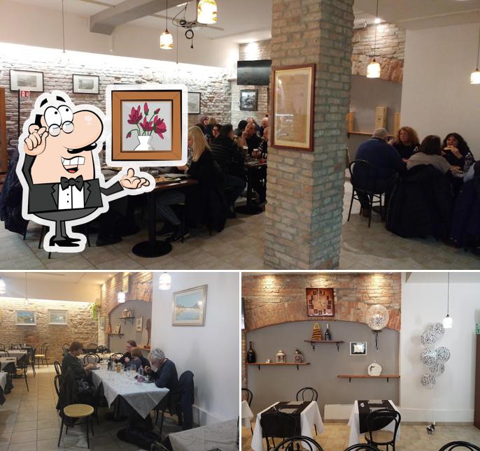 Dai un'occhiata agli interni di Ristorante Ai Tre Scaini