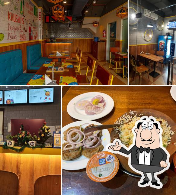 Take a seat at one of the tables at Biryani Blues