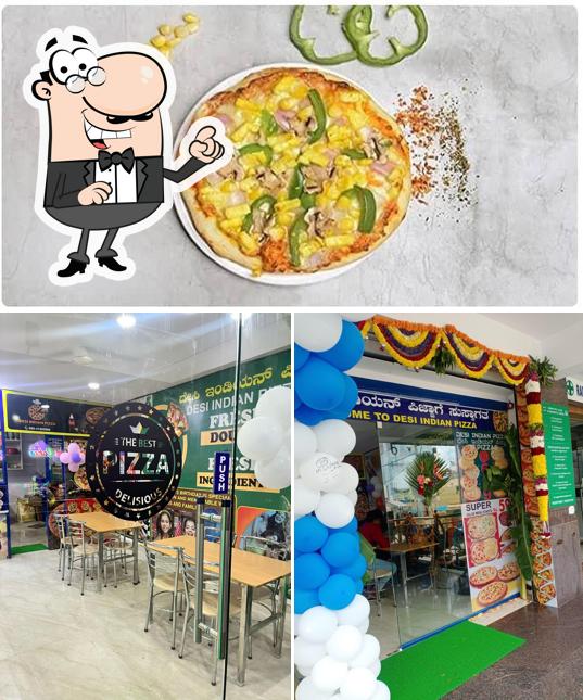 The picture of DESI INDIAN PIZZA’s interior and food