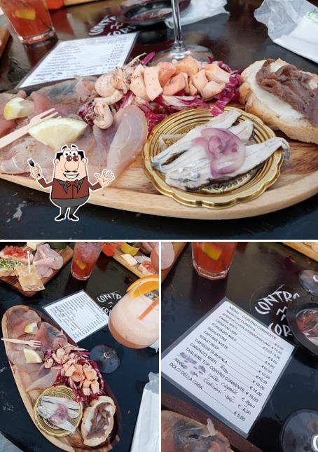 Questa è la immagine che mostra la cibo e interni di Disco pub controcorrente