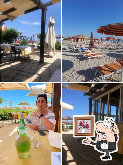 Dai un'occhiata agli interni di Caracoles Ristorante di pesce e stabilimento balneare