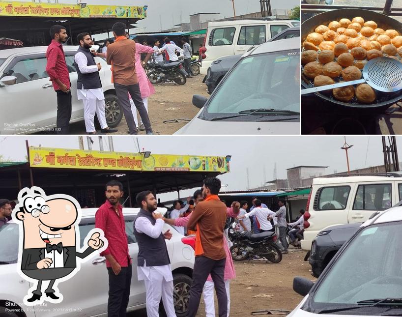 The photo of Maa Narmda Family Restaurant’s exterior and food