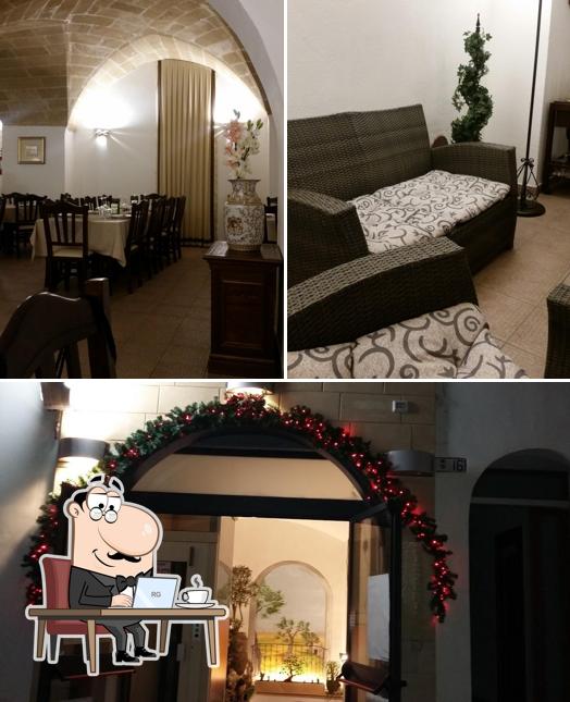 Guarda la immagine che presenta la interni e esterno di Caruso Ristorante - Pizzeria