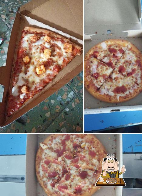 Pick pizza at La Milano Pizzeria