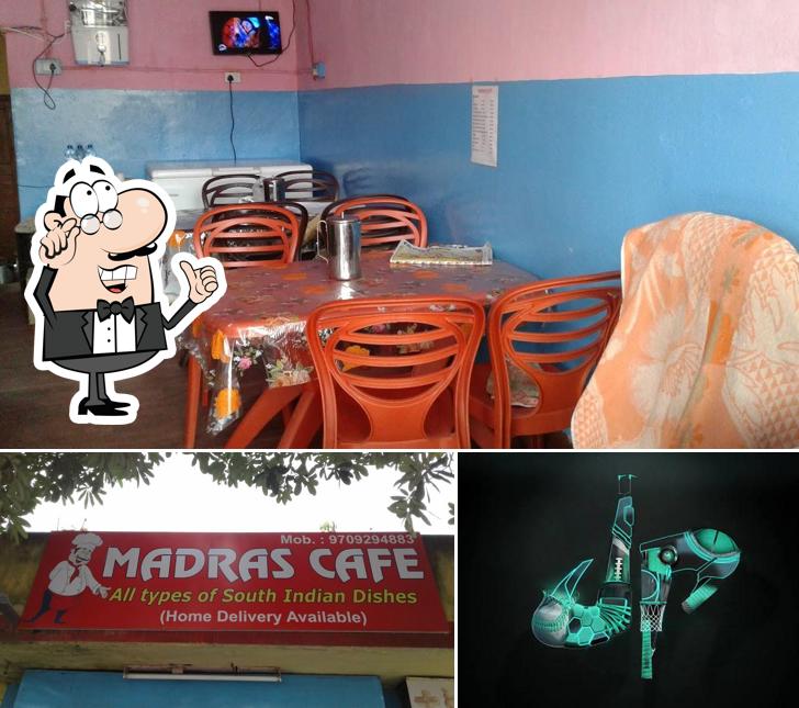 Take a seat at one of the tables at Madras Cafe