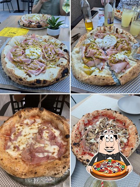 Prova una pizza a Pizza & Burger bar “Papa’S”